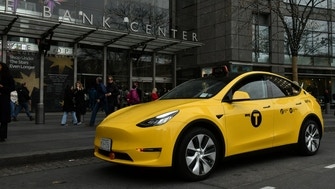 Gravity Tesla Model Y New York City yellow taxi cab 6